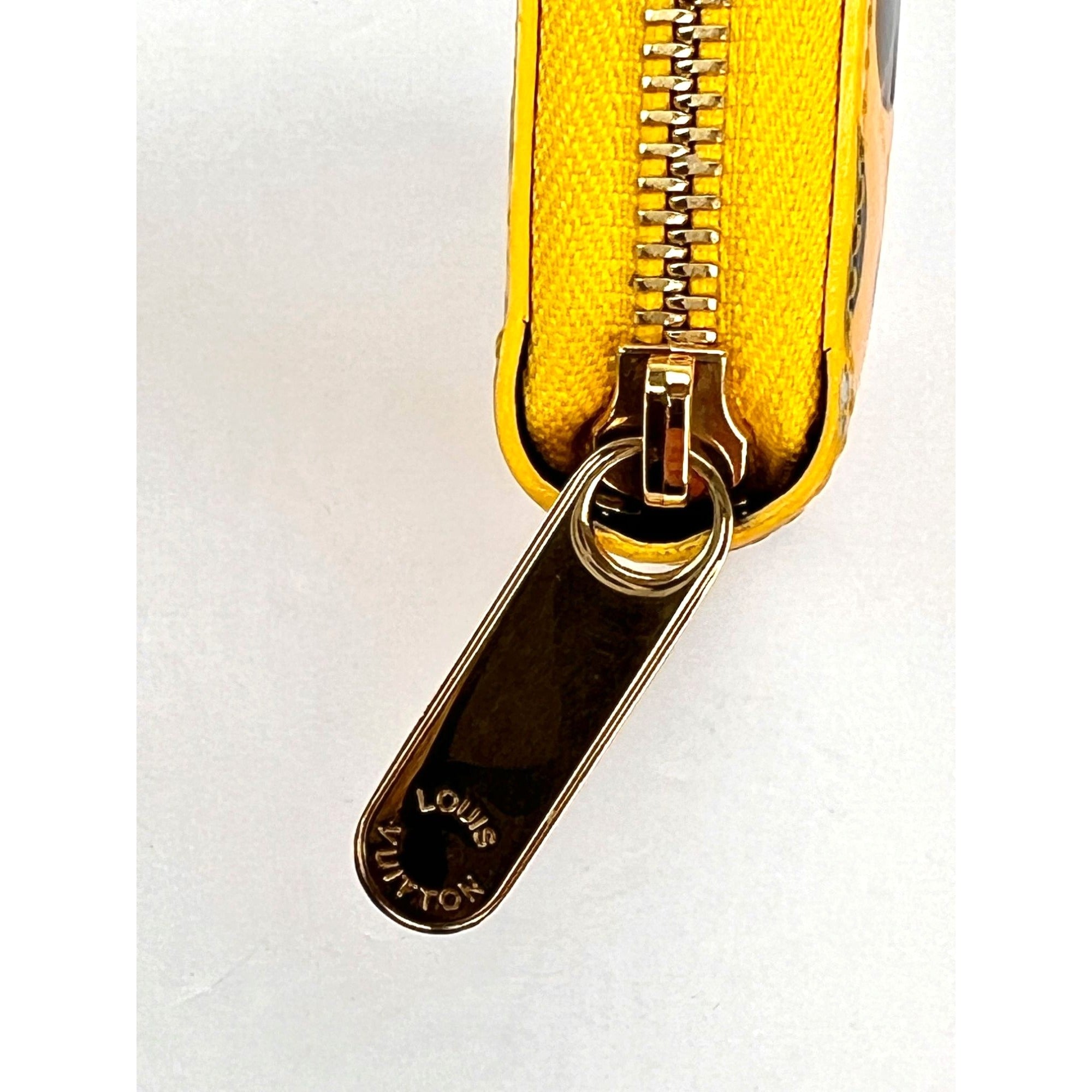 Ví Louis Vuitton Kusama Infinity Dots Zippy Leather Yellow Vernis Patent Leather