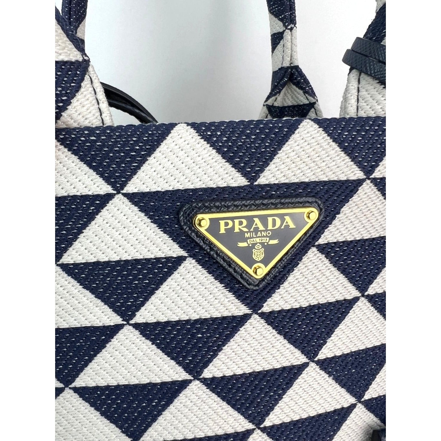 Túi xách vải thêu biểu tượng nhỏ Prada
