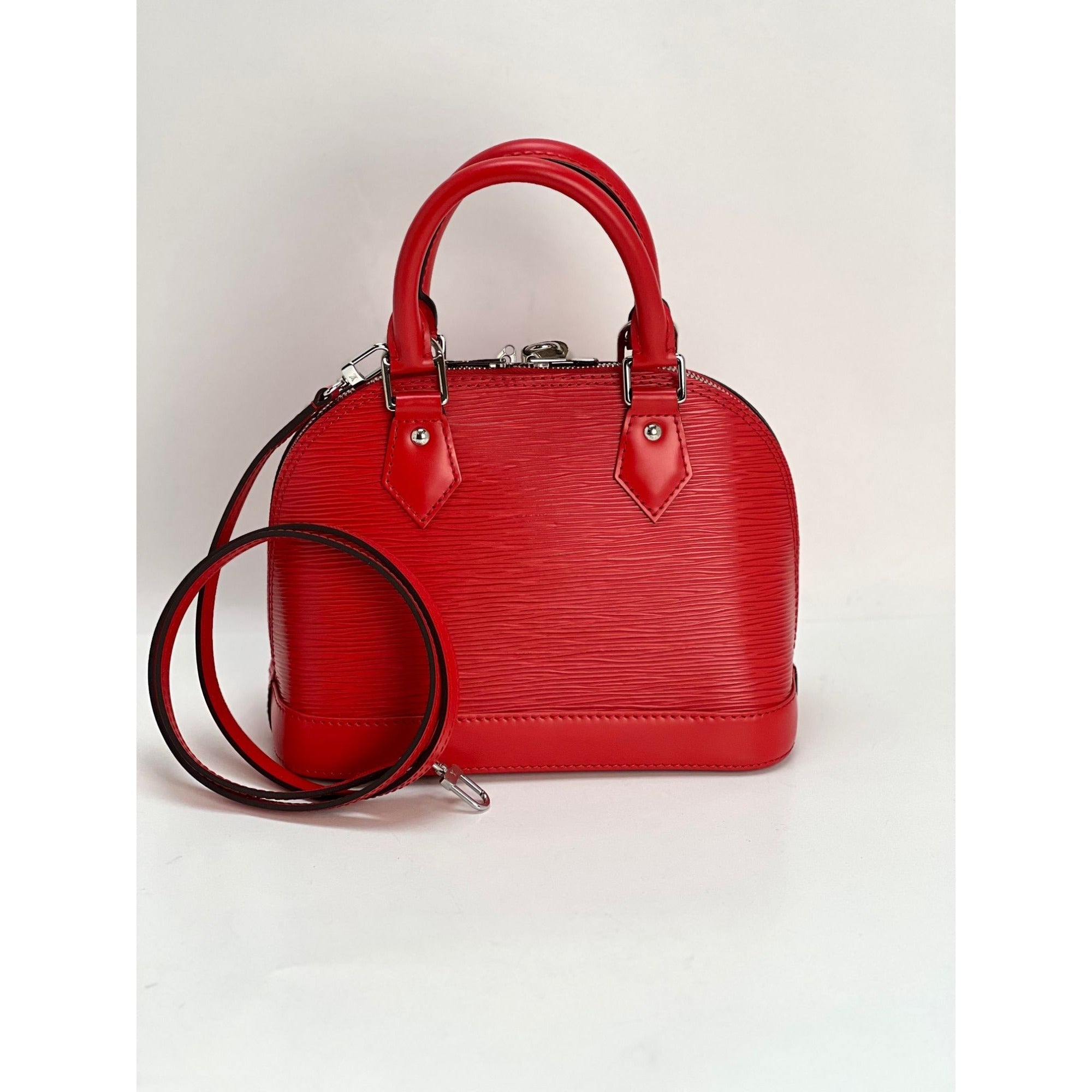 Túi đeo vai LOUIS VUITTON Alma BB Epi coquelicot