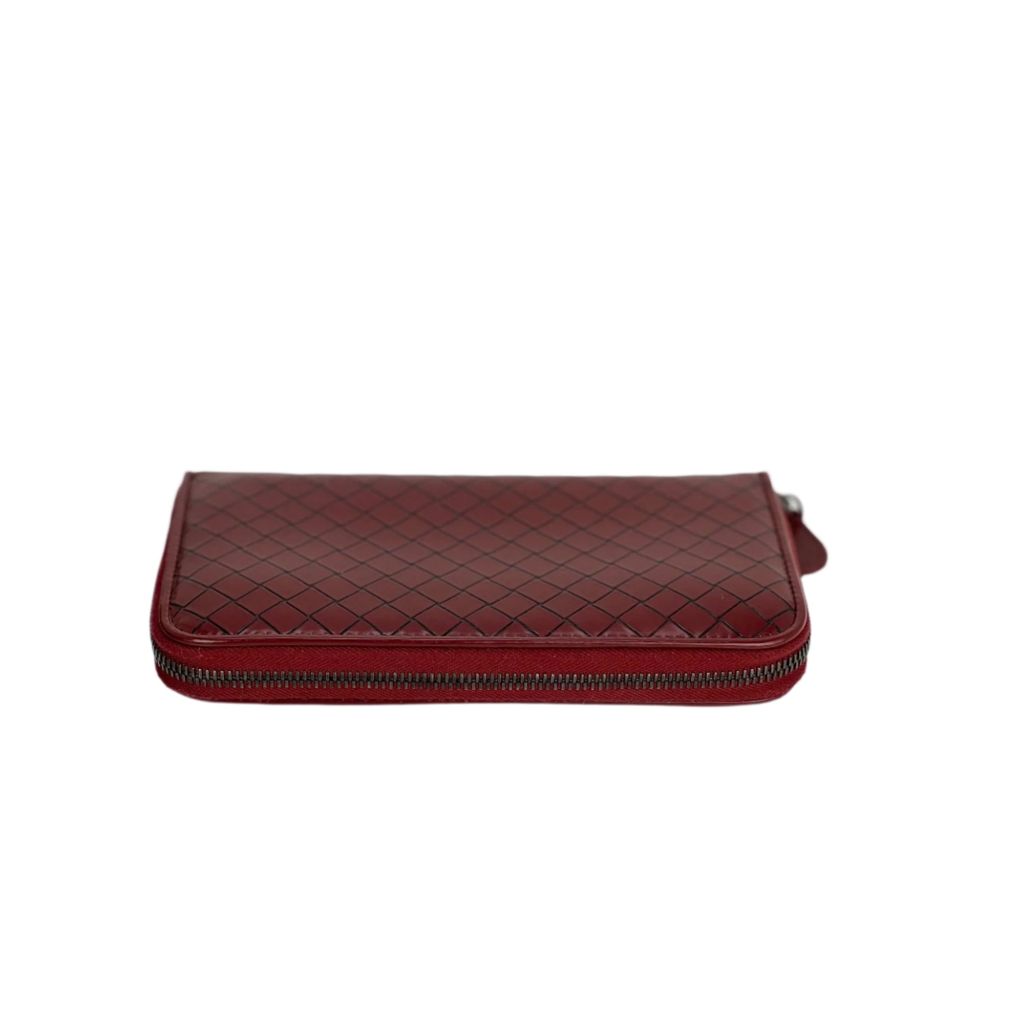 Ví cầm tay da Bottega Veneta Burgundy Intrecciato có khóa kéo