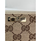 Ví dài bằng vải canvas có khóa kéo logo Gucci GG màu be