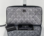 Ví cầm tay Chanel Perforated Silver Metallic Lambskin Quilted Zip Around
