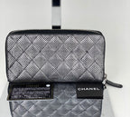 Ví cầm tay Chanel Perforated Silver Metallic Lambskin Quilted Zip Around