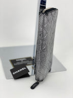 Ví cầm tay Chanel Perforated Silver Metallic Lambskin Quilted Zip Around