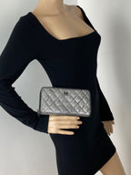 Ví cầm tay Chanel Perforated Silver Metallic Lambskin Quilted Zip Around