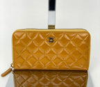 Ví cầm tay Chanel Quilted Yellow Patent Leather Brilliant Zip Around