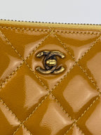Ví cầm tay Chanel Quilted Yellow Patent Leather Brilliant Zip Around