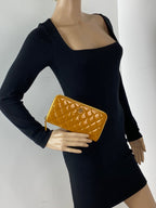 Ví cầm tay Chanel Quilted Yellow Patent Leather Brilliant Zip Around