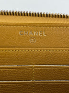 Ví cầm tay Chanel Quilted Yellow Patent Leather Brilliant Zip Around