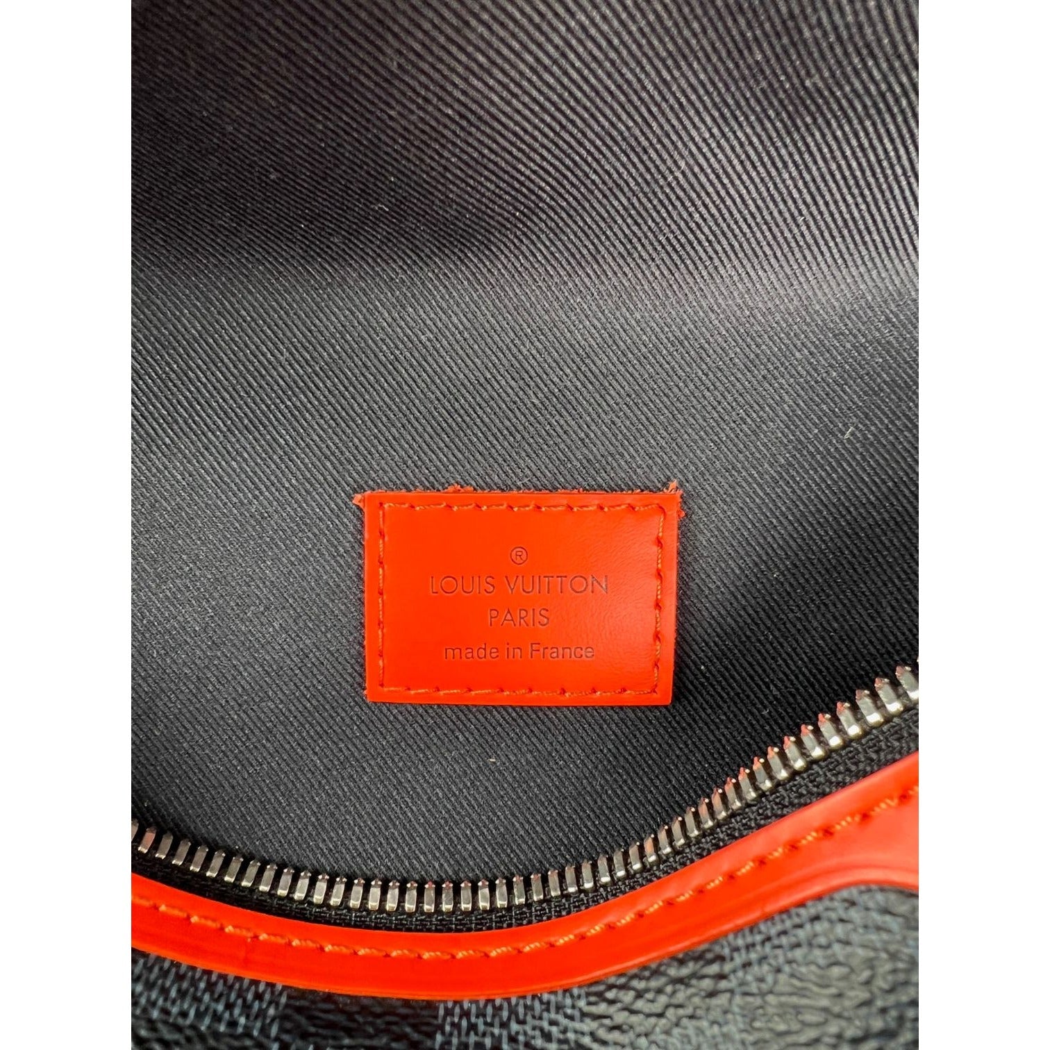 Túi đeo chéo Louis Vuitton Damier Colbart màu cam Race Discovery Bumbag
