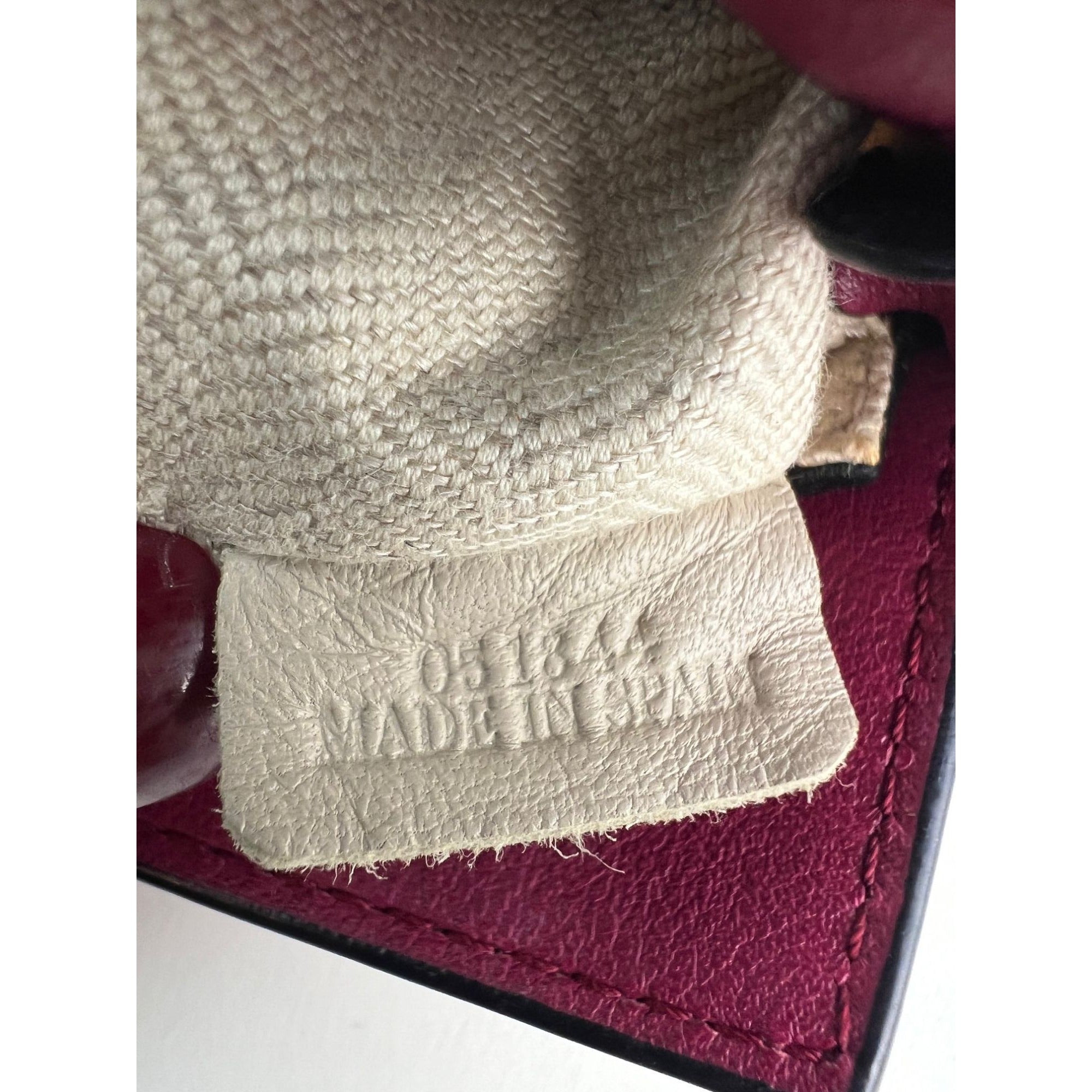Túi xách đeo chéo Loewe Calfskin Mini Crimson Puzzle