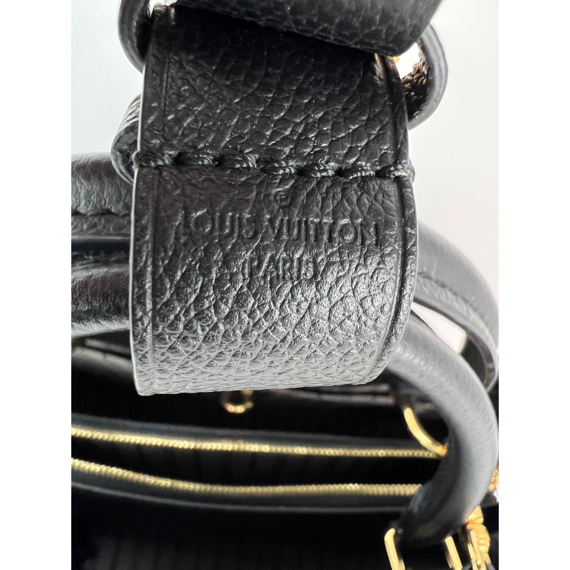 Túi đeo vai da đen Louis Vuitton Montaigne MM Empreinte