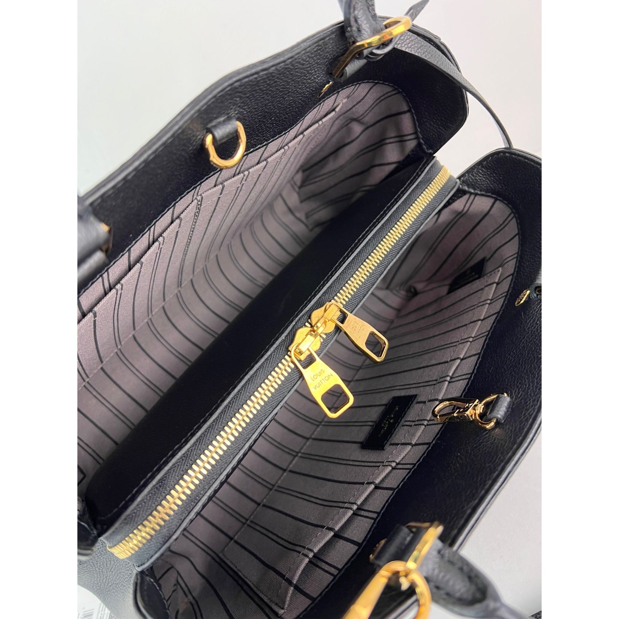 Túi đeo vai da đen Louis Vuitton Montaigne MM Empreinte