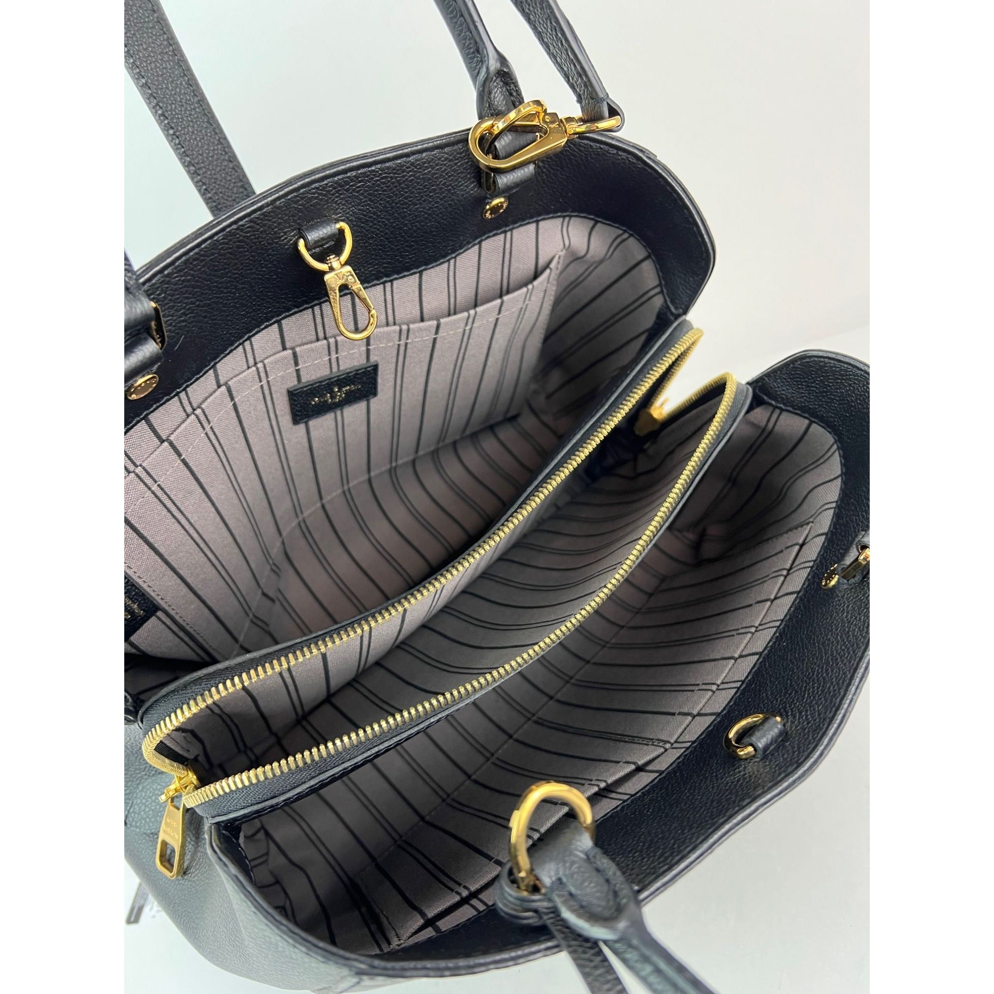 Túi đeo vai da đen Louis Vuitton Montaigne MM Empreinte