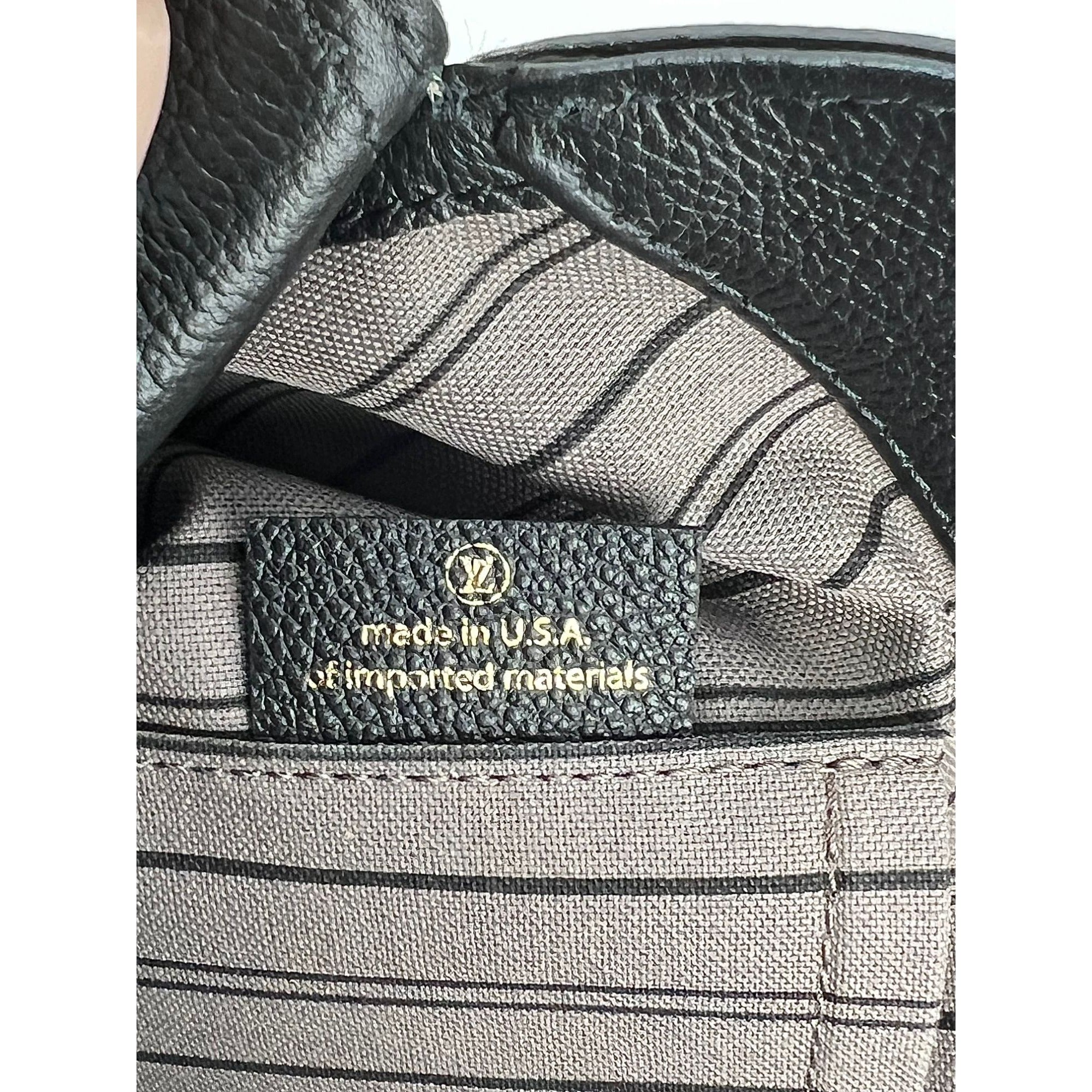 Túi đeo vai da đen Louis Vuitton Montaigne MM Empreinte