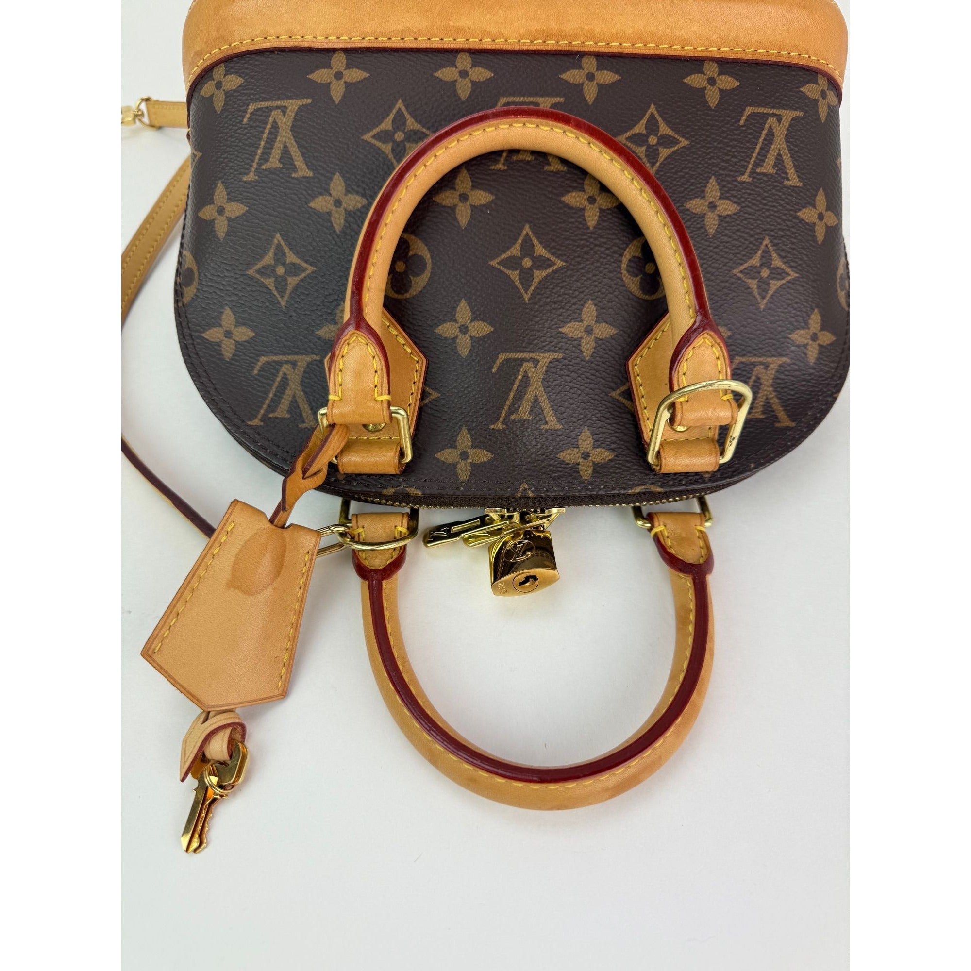 Túi đeo chéo Louis Vuitton Alma BB Monogram
