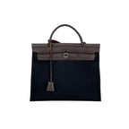 Túi đeo vai Hermes Toile vache Hunter Herbag zip 31 PM màu đen Ebene