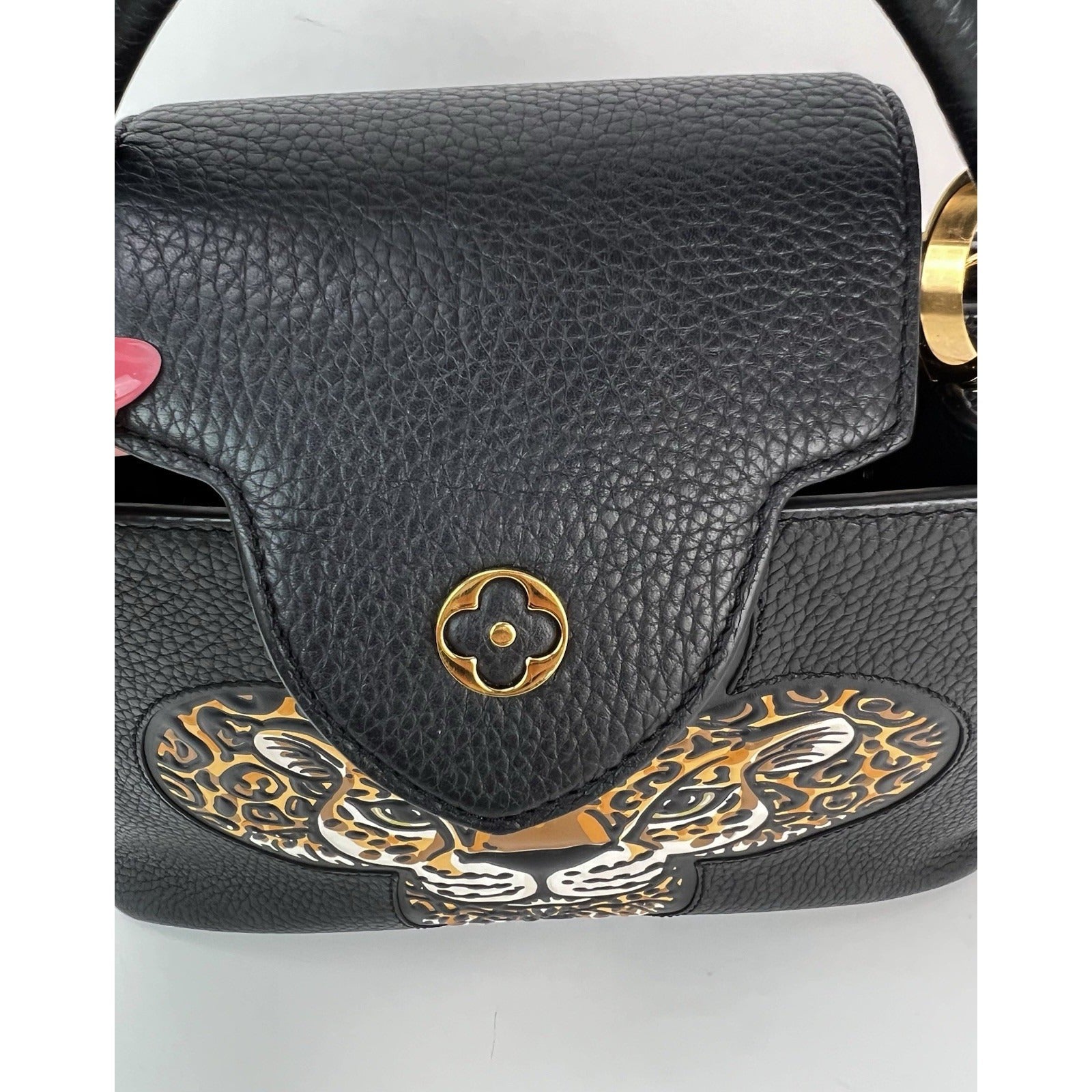 Túi đeo vai Louis Vuitton Taurillon Capucines Trapped Leopard BB màu đen