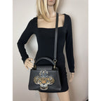 Túi đeo vai Louis Vuitton Taurillon Capucines Trapped Leopard BB màu đen