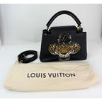 Túi đeo vai Louis Vuitton Taurillon Capucines Trapped Leopard BB màu đen
