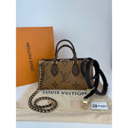 Túi đeo chéo Louis Vuitton Onthego East West Chain