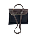 Túi đeo vai Hermes Toile vache Hunter Herbag zip 31 PM màu đen Ebene
