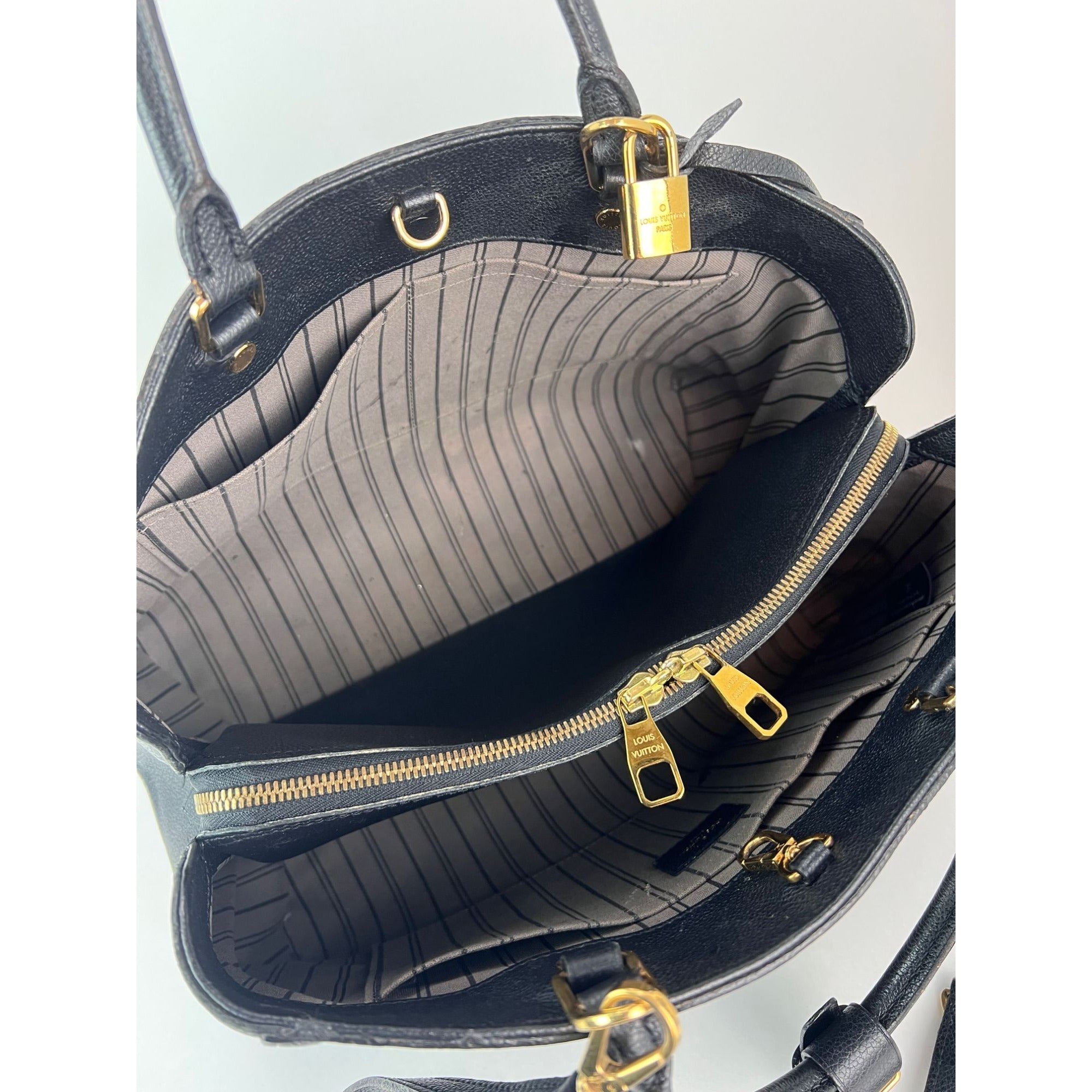 Túi xách da Louis Vuitton Montaigne GM Black Empriente