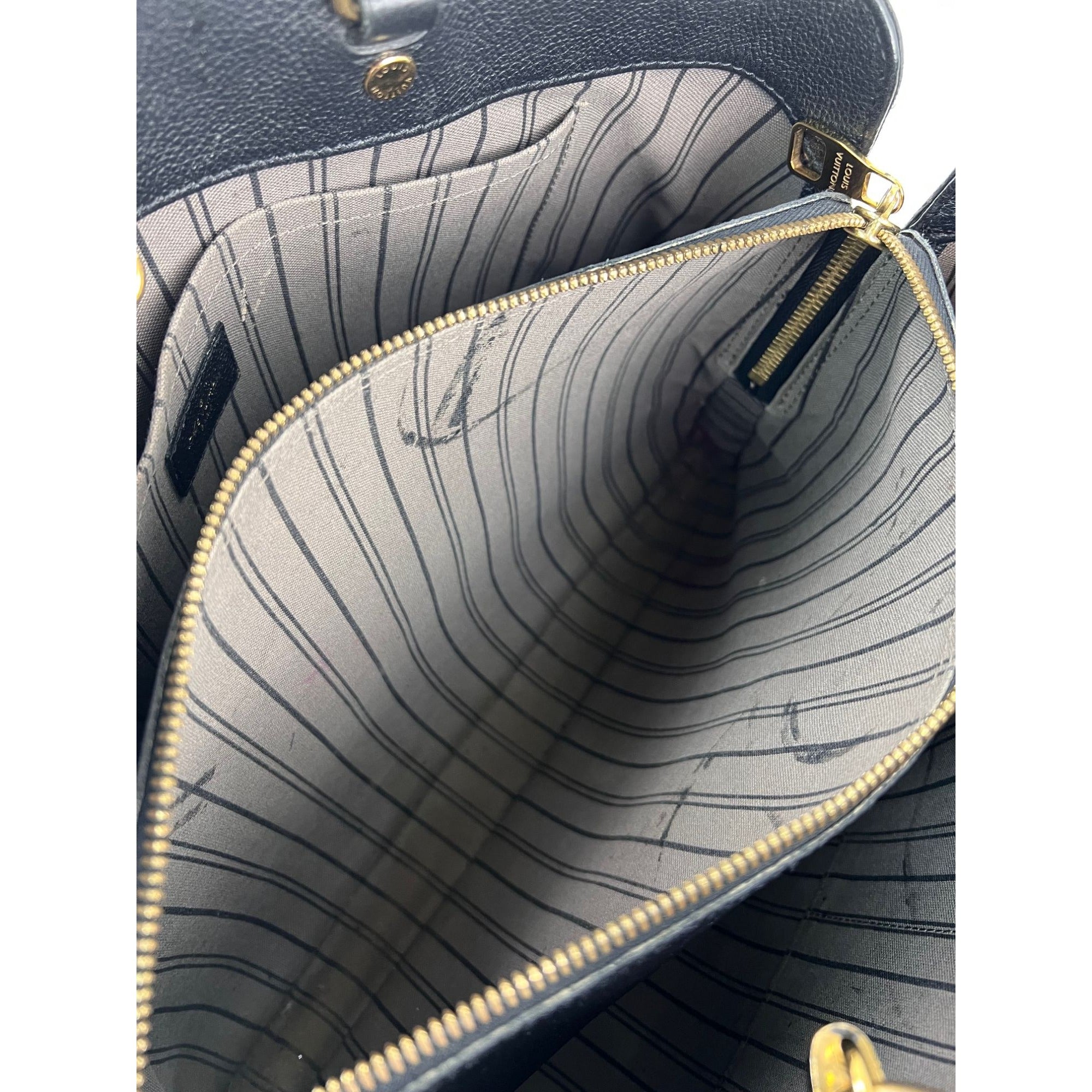 Túi xách da Louis Vuitton Montaigne GM Black Empriente