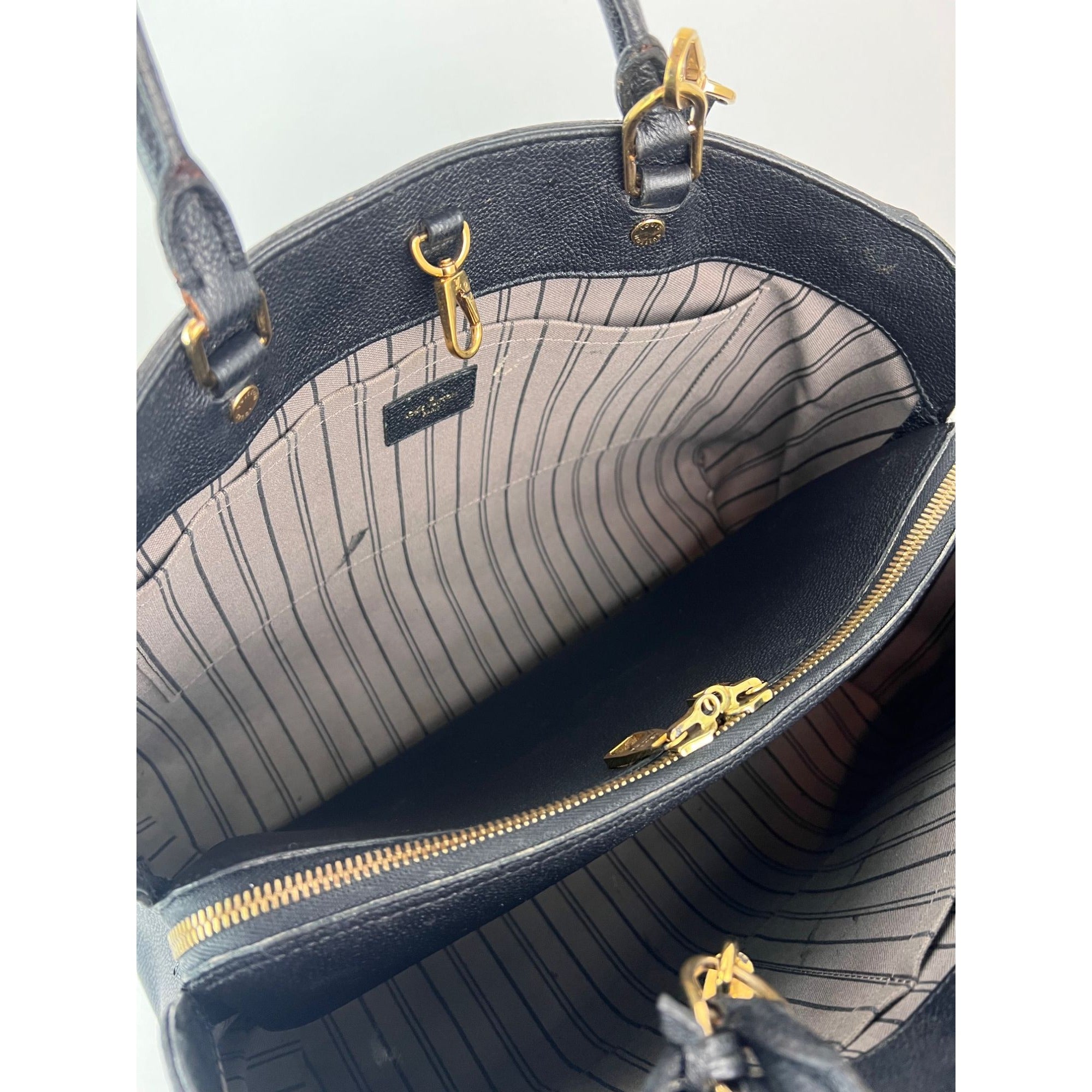 Túi xách da Louis Vuitton Montaigne GM Black Empriente