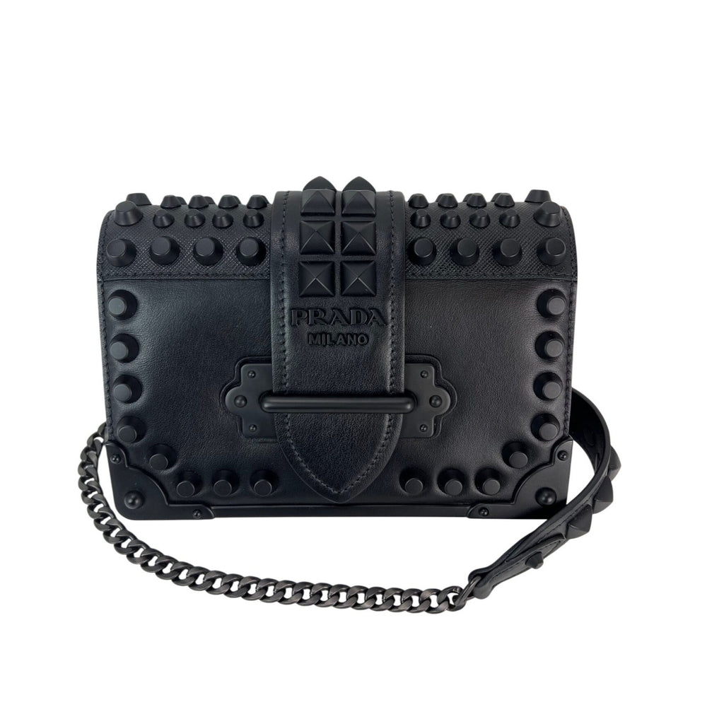Túi đeo chéo Prada City Calfskin Saffiano Studded Cahier màu đen